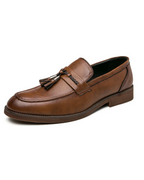 Mocasines de piel con borlas